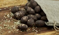 Kakaobohnen in Schokolade mit gerösteten Hanfsamen -...